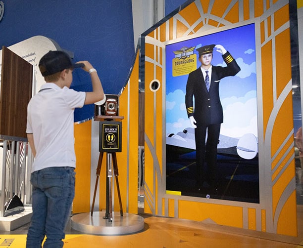 Young Boy Using Ai At Museum