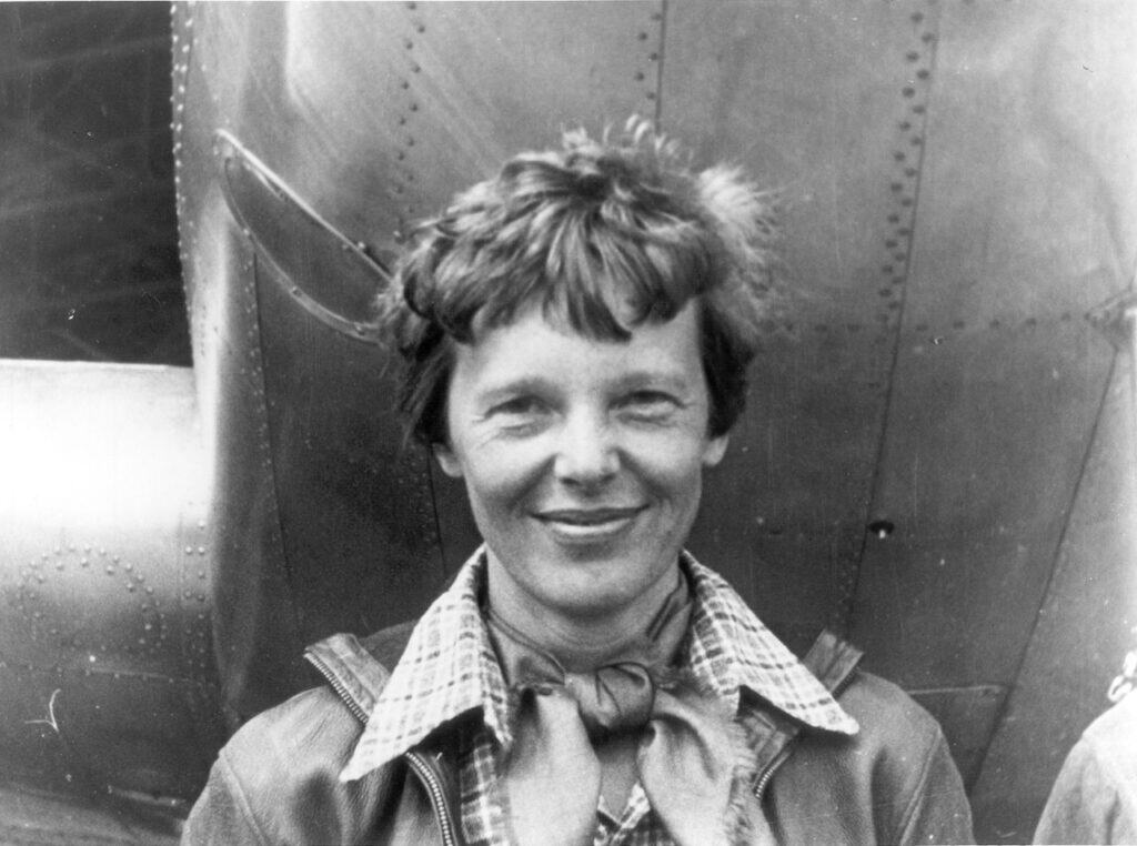 Amelia Earhart Standing Under Nose Of Her Lockheed Model 10 E Electra, Small
