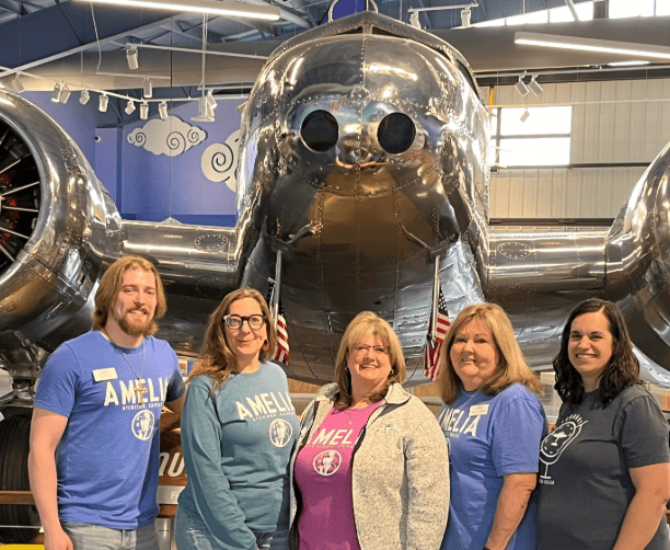 Museum Staff Standing Before Muriel